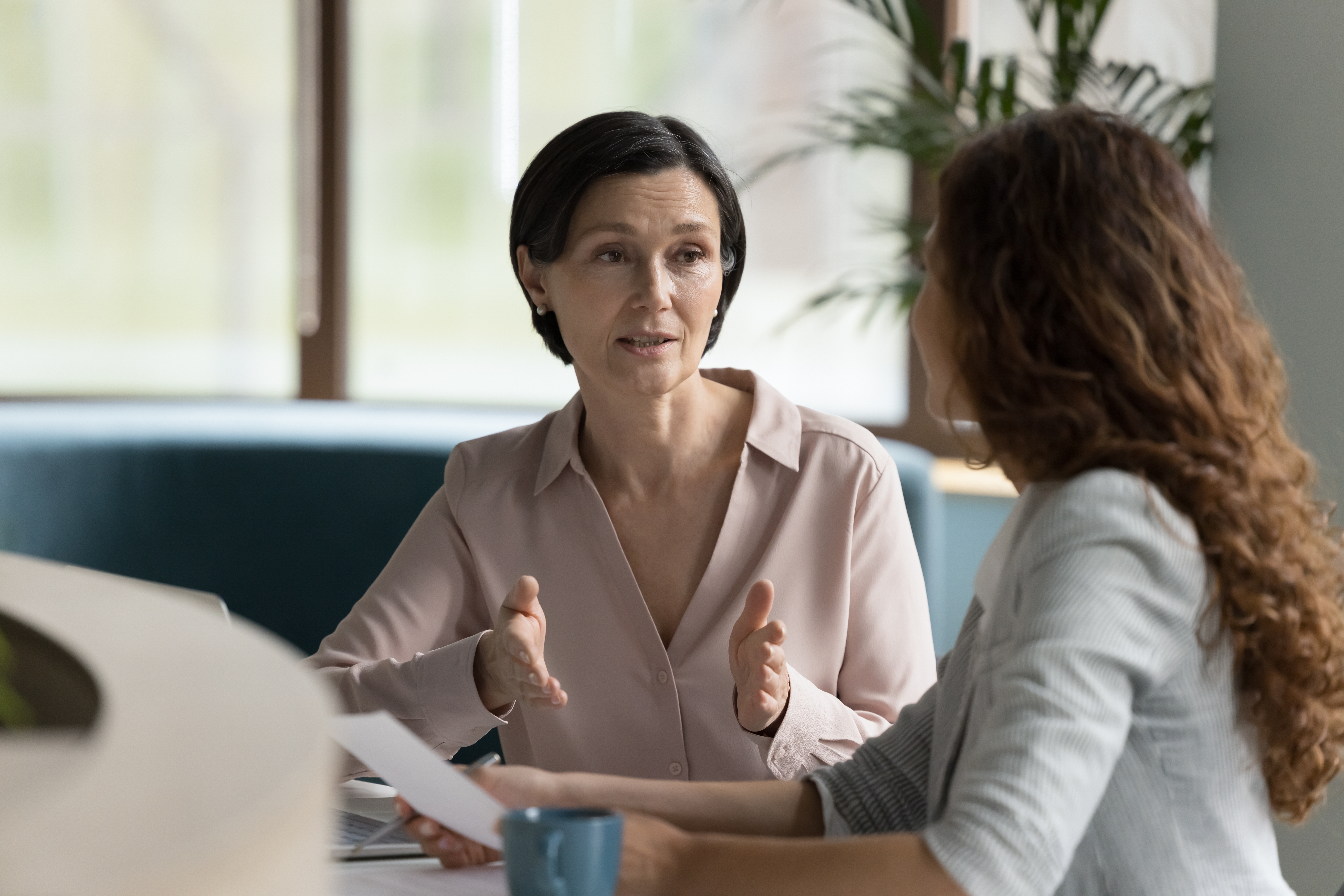 woman discussing the marketing role of the employee